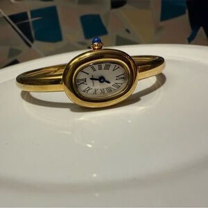 BAIGNOIRE inspired Gold Oval Bangle Watch with Blue Accent